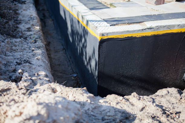 Professional Waterproofing technician working in Elba, AL